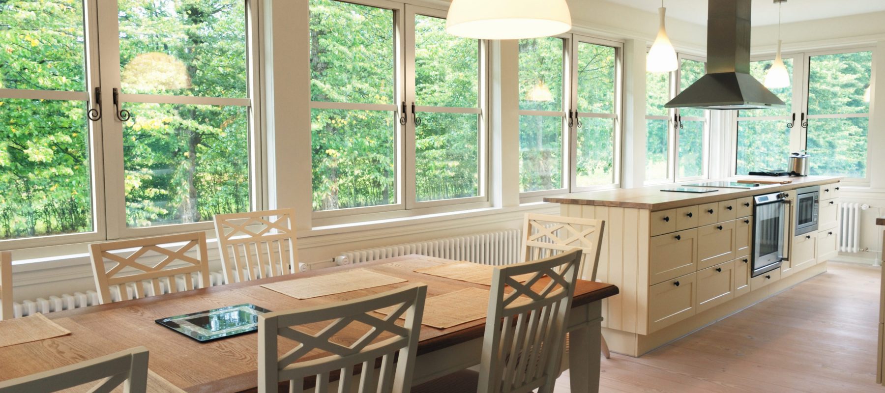 light kitchen interior,  chairs, desk, windows